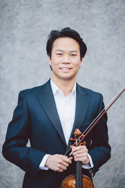 Opera’s New Concertmaster Nikki Chooi posing for photo
