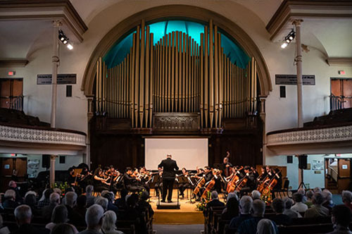 Classical orchestra performing in Alix Goolden Performance Hall 2022 500x332 px