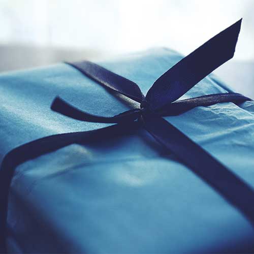 Blue gift with ribbon 500px