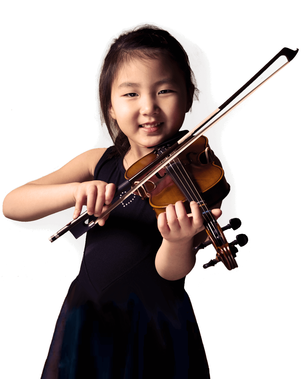 A young girl playing the violin