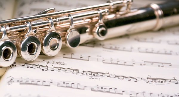 Flute on sheet music